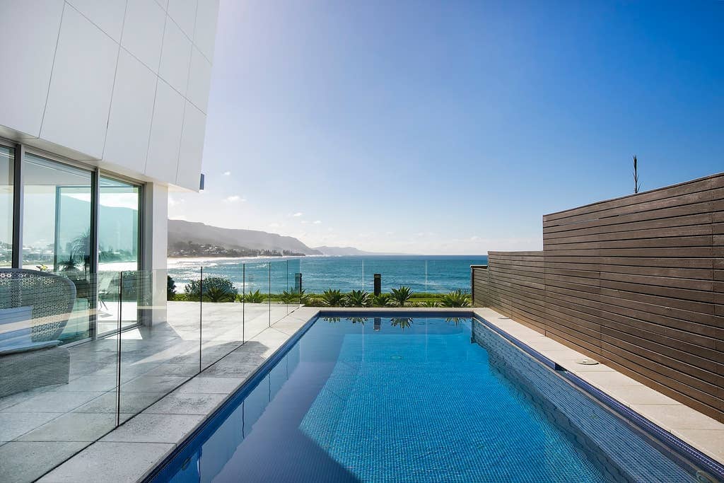 Wooden Beam At The Pool — Coastline Property Wollongong  In Woonona, NSW