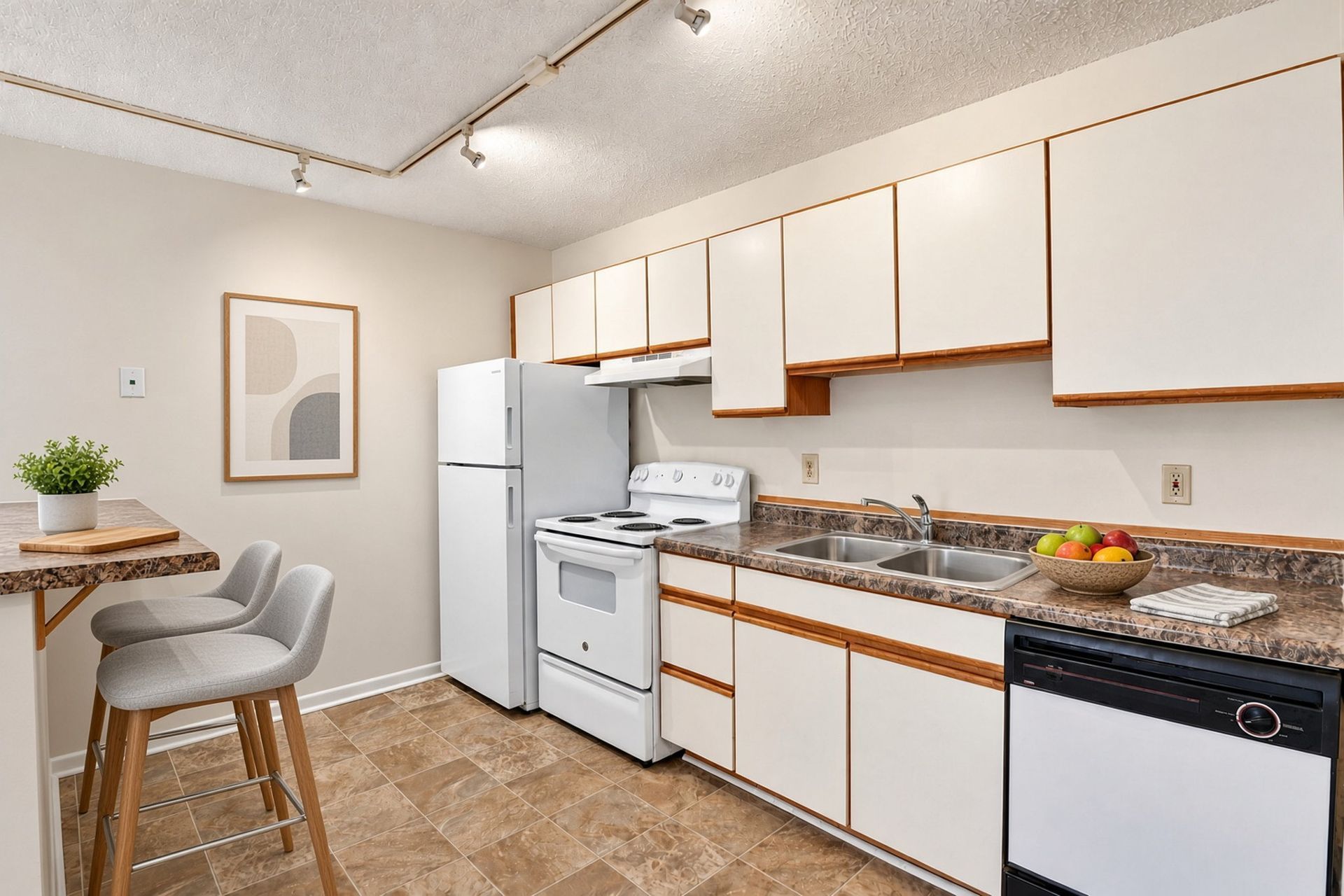 Classic-style kitchen with breakfast ledge at The Groves