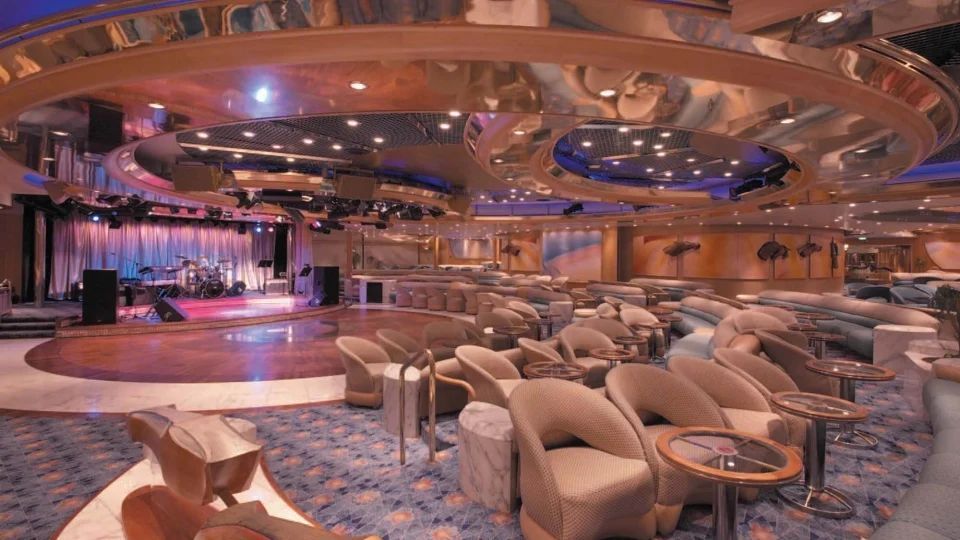A group of people are playing roulette in a casino.