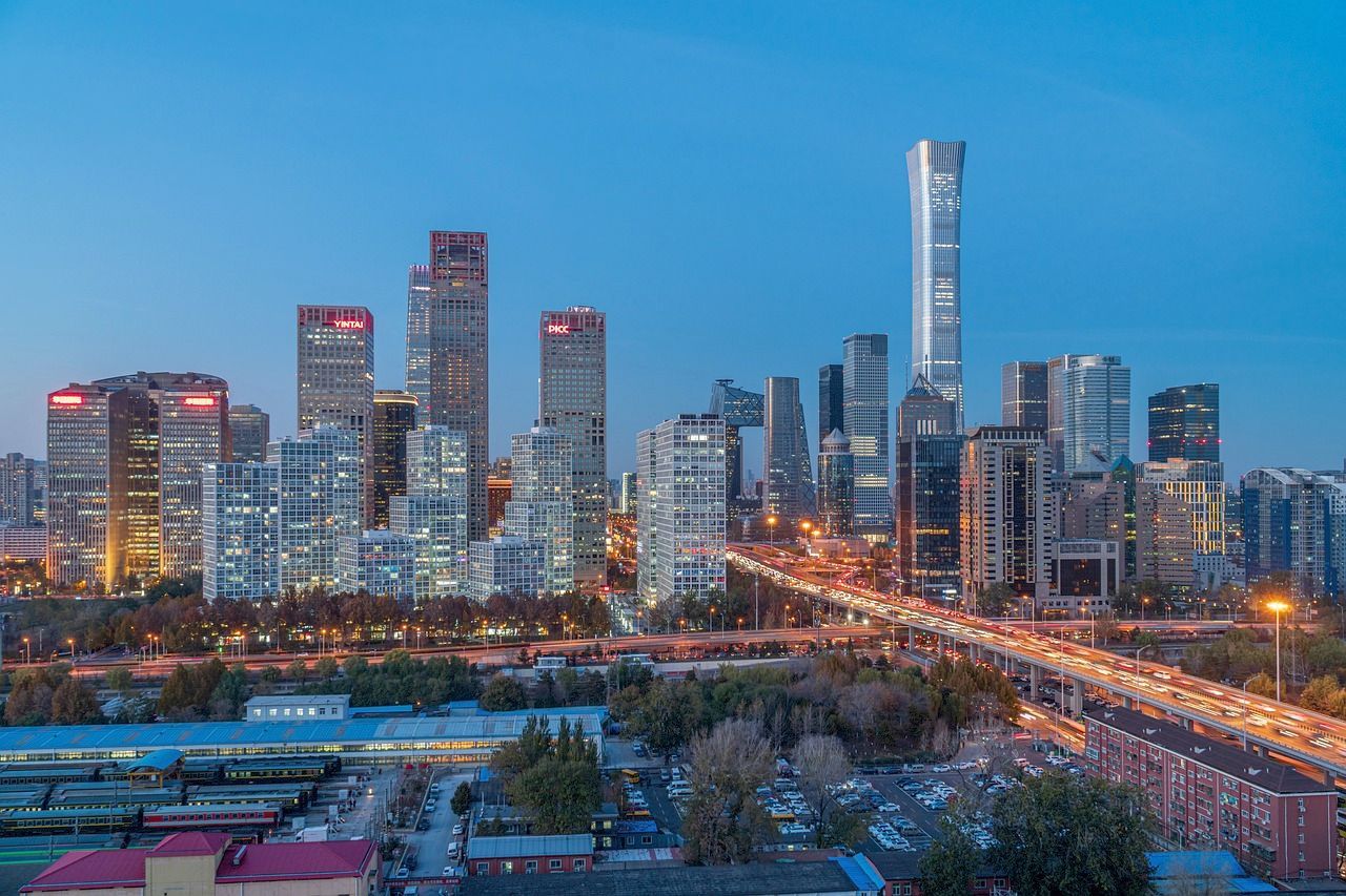 An aerial view of a city skyline at night.