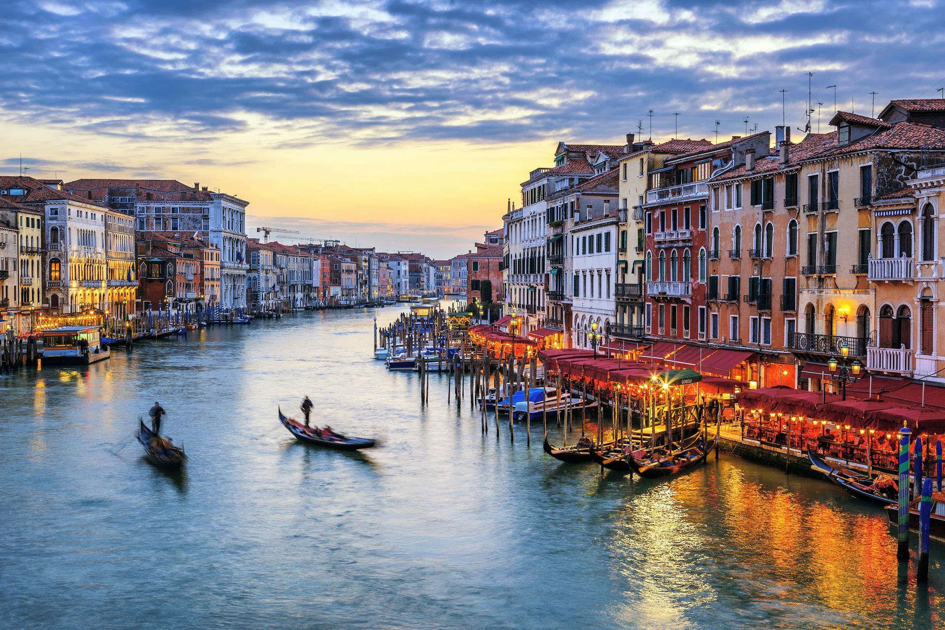 Sunset view of Grand Canal, a channel in Venice, Italy.