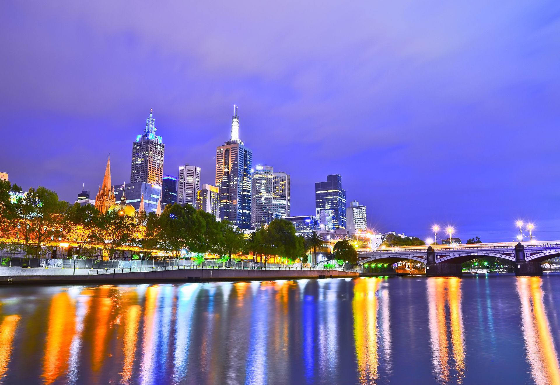 Dusk view of Melbourne skyline from Yarra River in Australia.