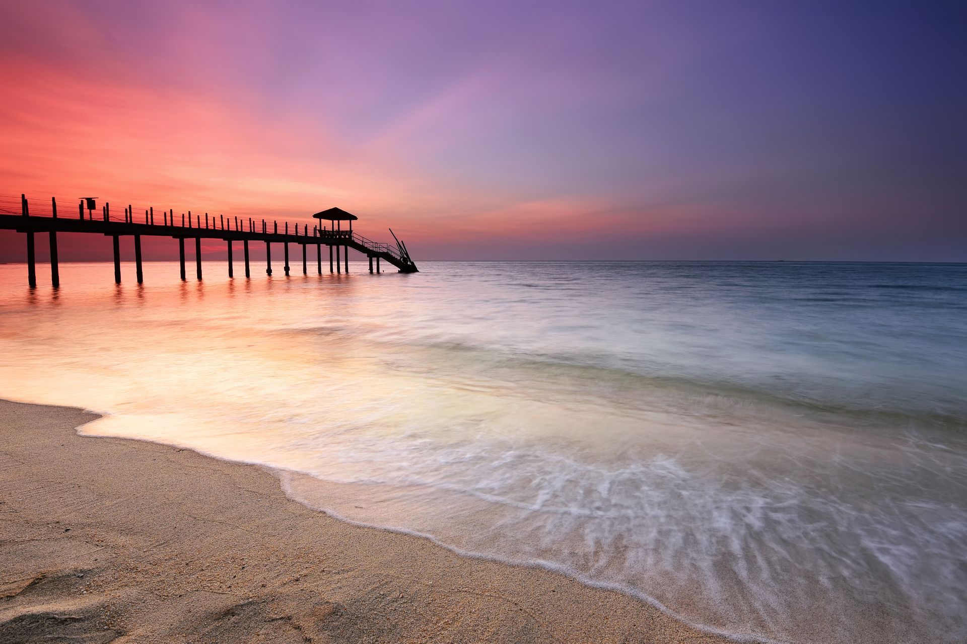 Sunset view of Pantai Kerachut, a beach in Penang National Park, Malaysia.