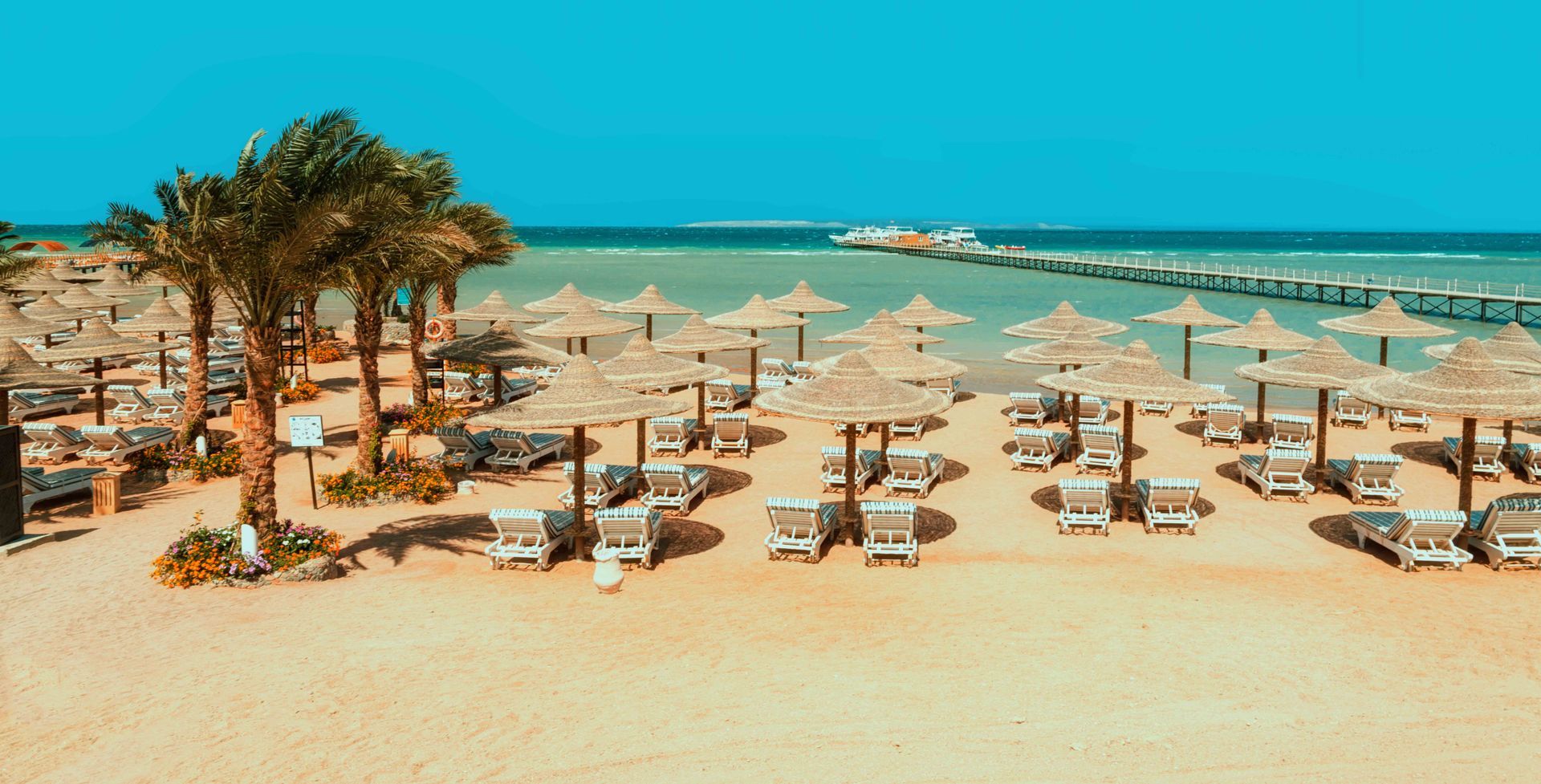 Beach view of El Karma Aqua Beach Resort, a four-star hotel in Hurghada, Egypt.