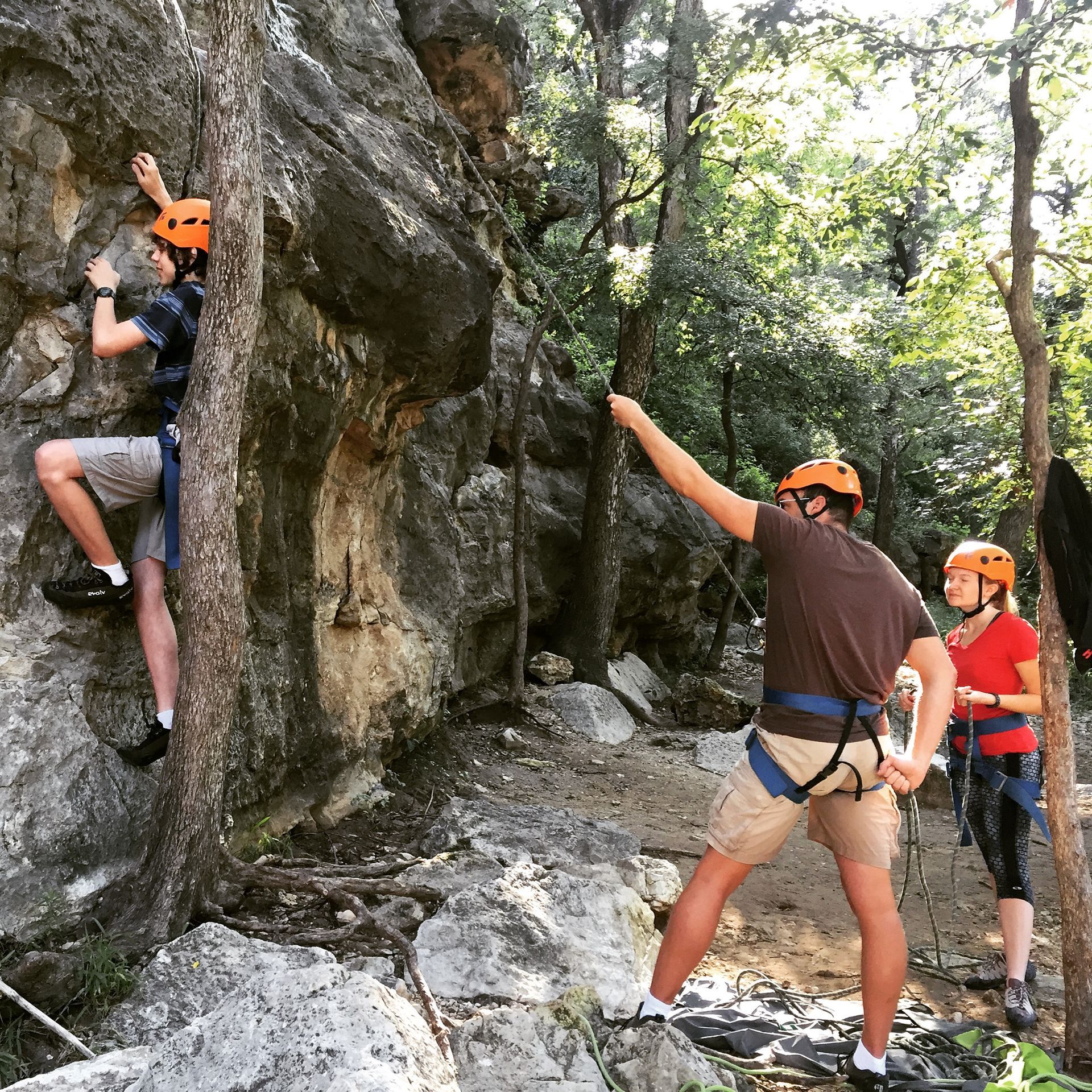 Beginner climber on limestone at the Austin Greenbelt