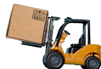 Yellow forklift carrying a cardboard box labeled 