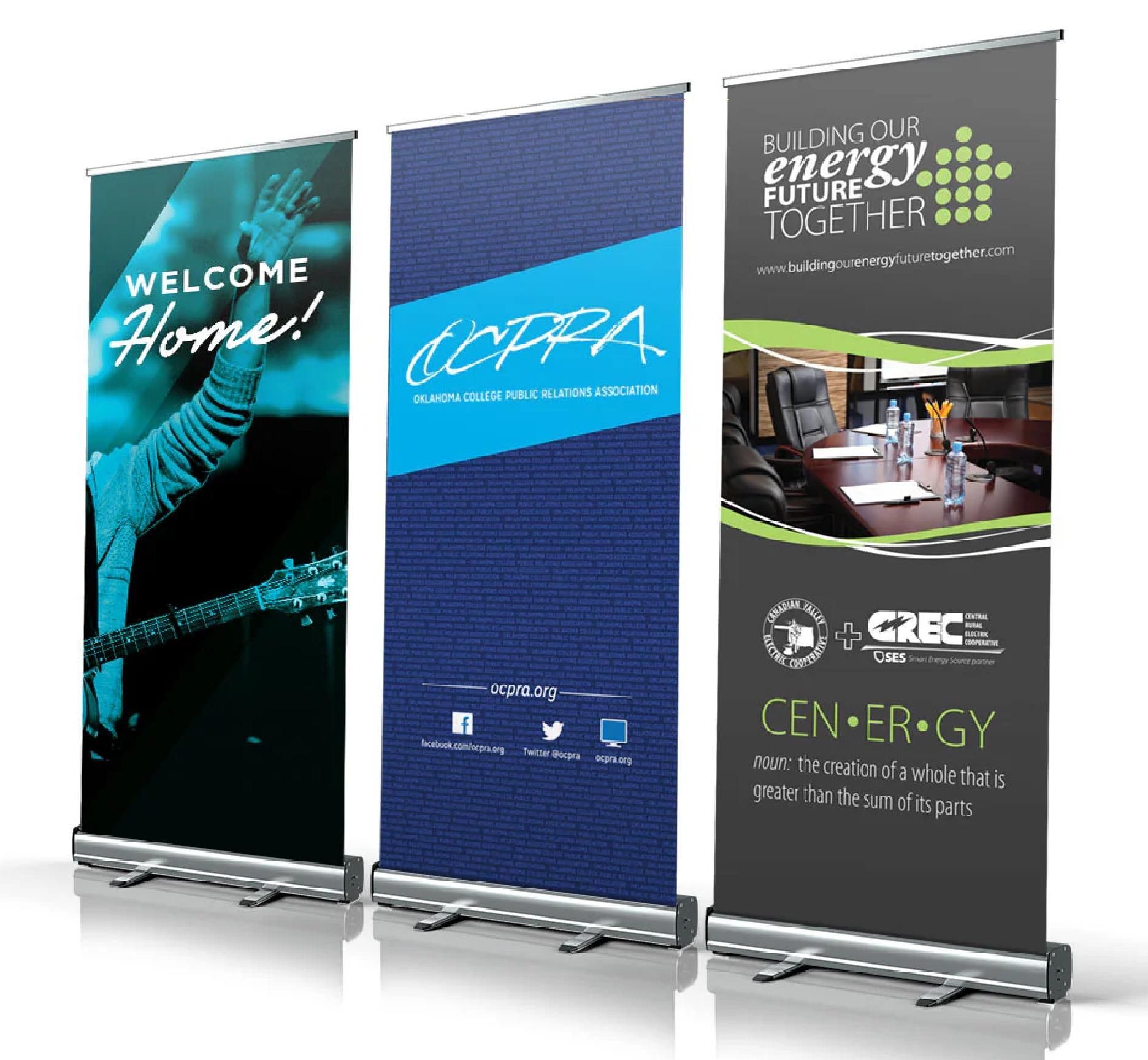 Three standing banner displays with blue, teal, and gray designs on a white background