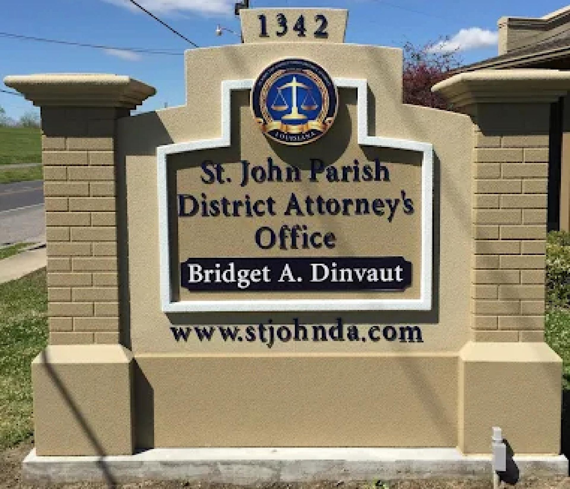 St. John Parish District Attorney's Office sign with website and address number 1342