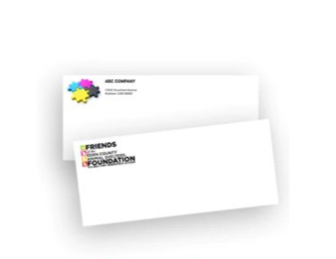 Two overlapping white business cards with colorful logo and Friends Foundation text