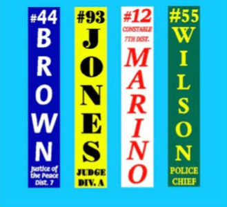 Four vertical campaign signs: Brown, Jones, Marino, and Wilson on blue, yellow, white, and green backgrounds.