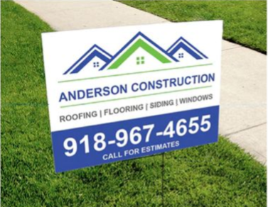 Anderson Construction yard sign on grass, blue and white, with phone number 918-967-4655 and services listed.