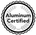 Aluminum Certified badge with text inside a laurel wreath and scalloped border.