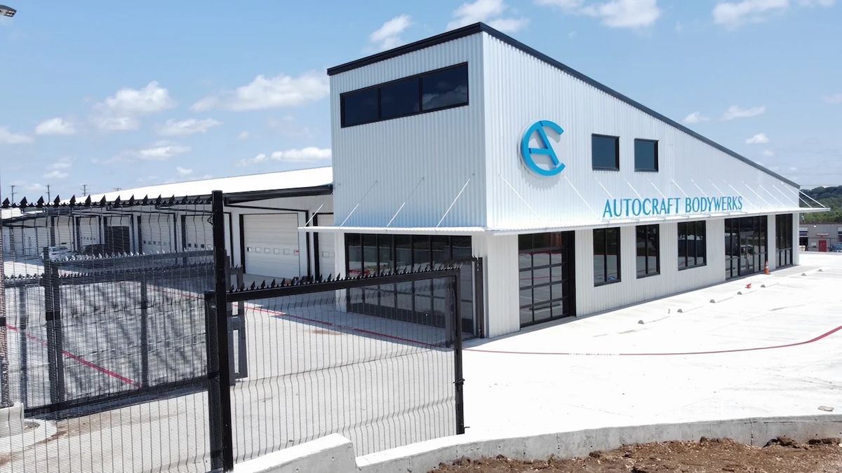 Modern commercial building with corrugated metal siding; 