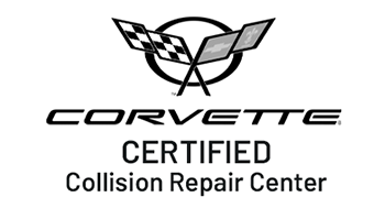 Corvette Certified Collision Repair Center logo with its signature crossed flags and oval emblem in black and white.