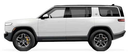 White Rivian SUV from the side with black accents, black tires, and yellow brake calipers.
