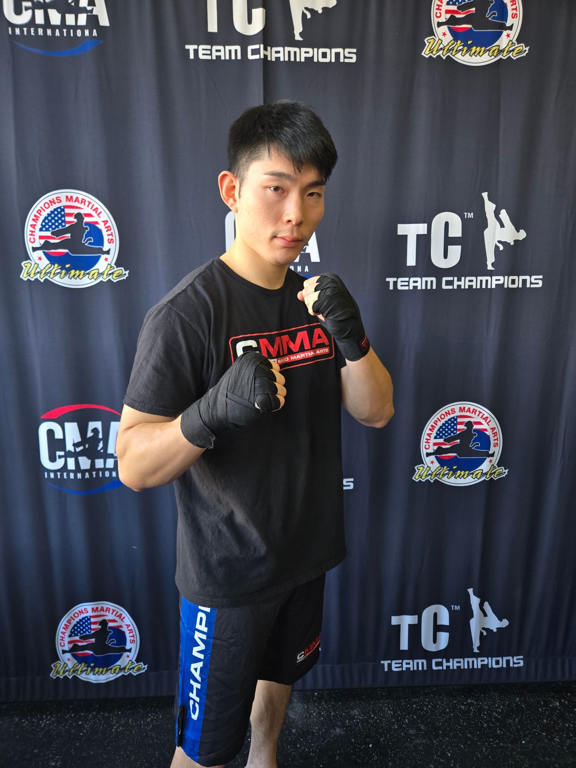 Women kickboxing and punching bags