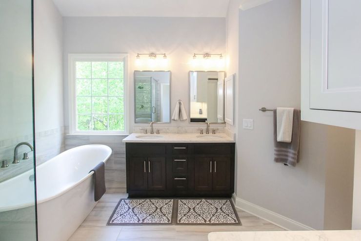 Accessible bathroom with curbless walk-in shower and grab bars
