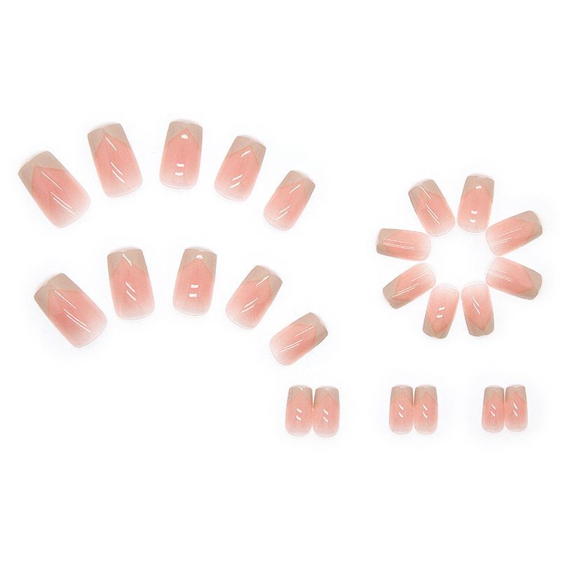 A close up of a person 's nails with a french manicure.
