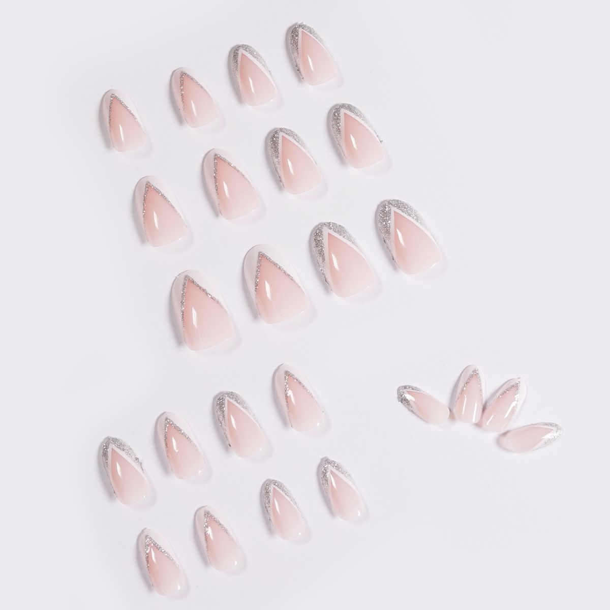 A close up of a woman 's nails with a white french manicure