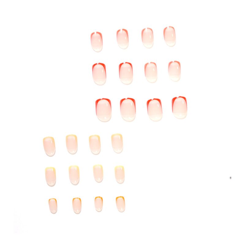 A close up of a woman 's nails with rings on them