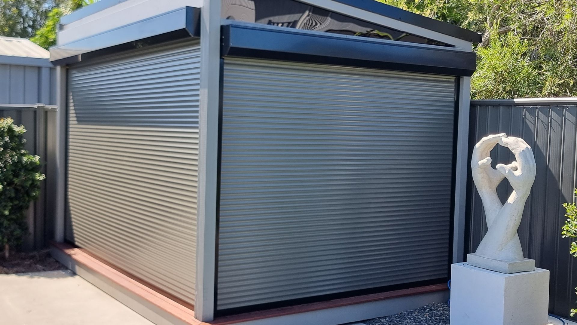 A Close Up Of A Row Of White Shutters On A Window — Modern Window Furnishings In Woodgate, QLD