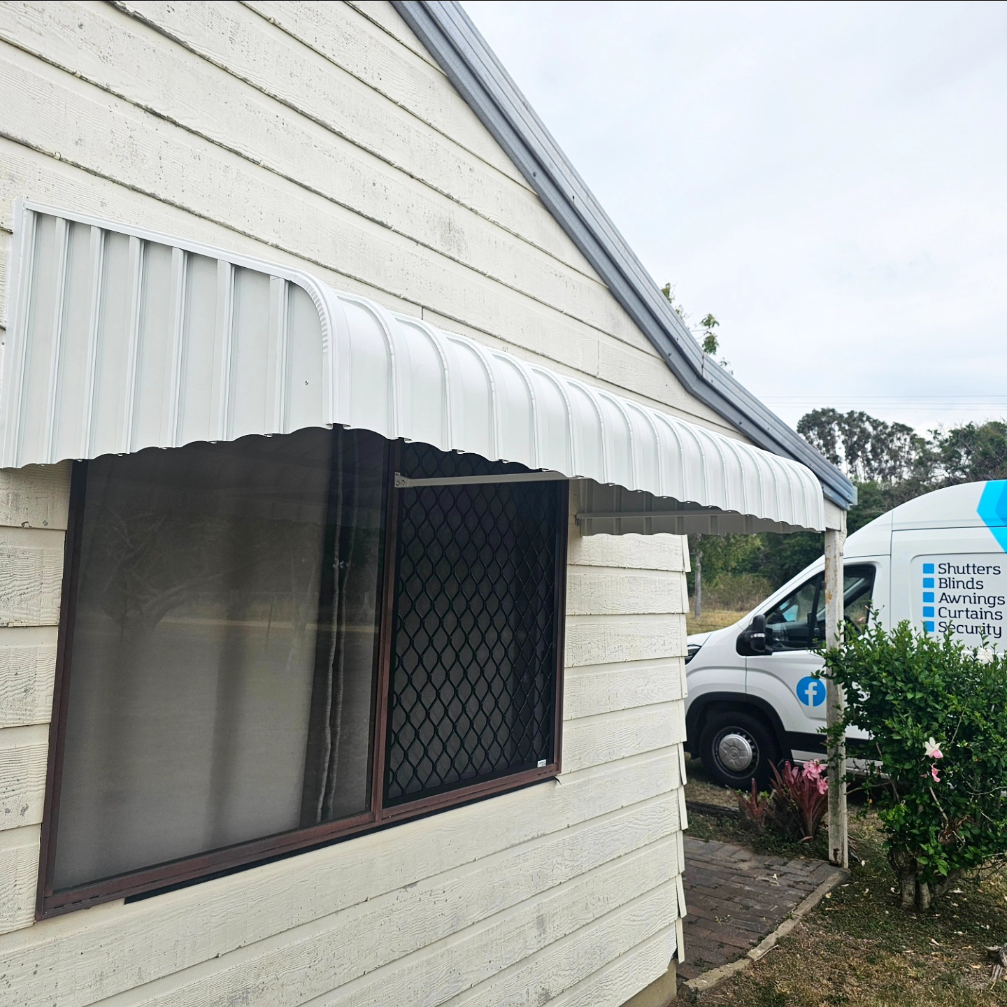 A Large White Awning Is Over A Swimming Pool — Modern Window Furnishings In Bundaberg East, QLD
