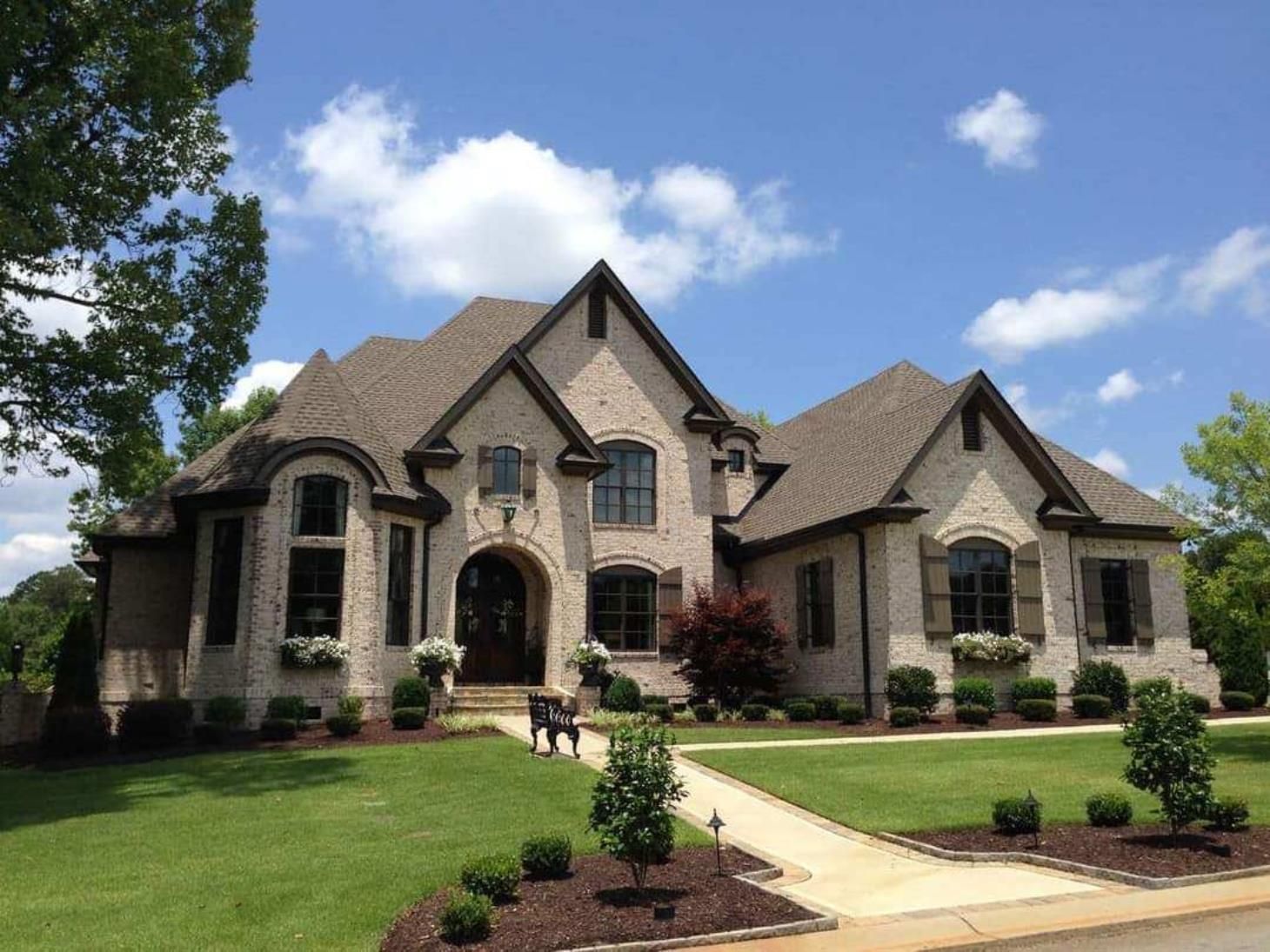 A freshly painted house showcasing a vibrant color scheme and impeccable finish.