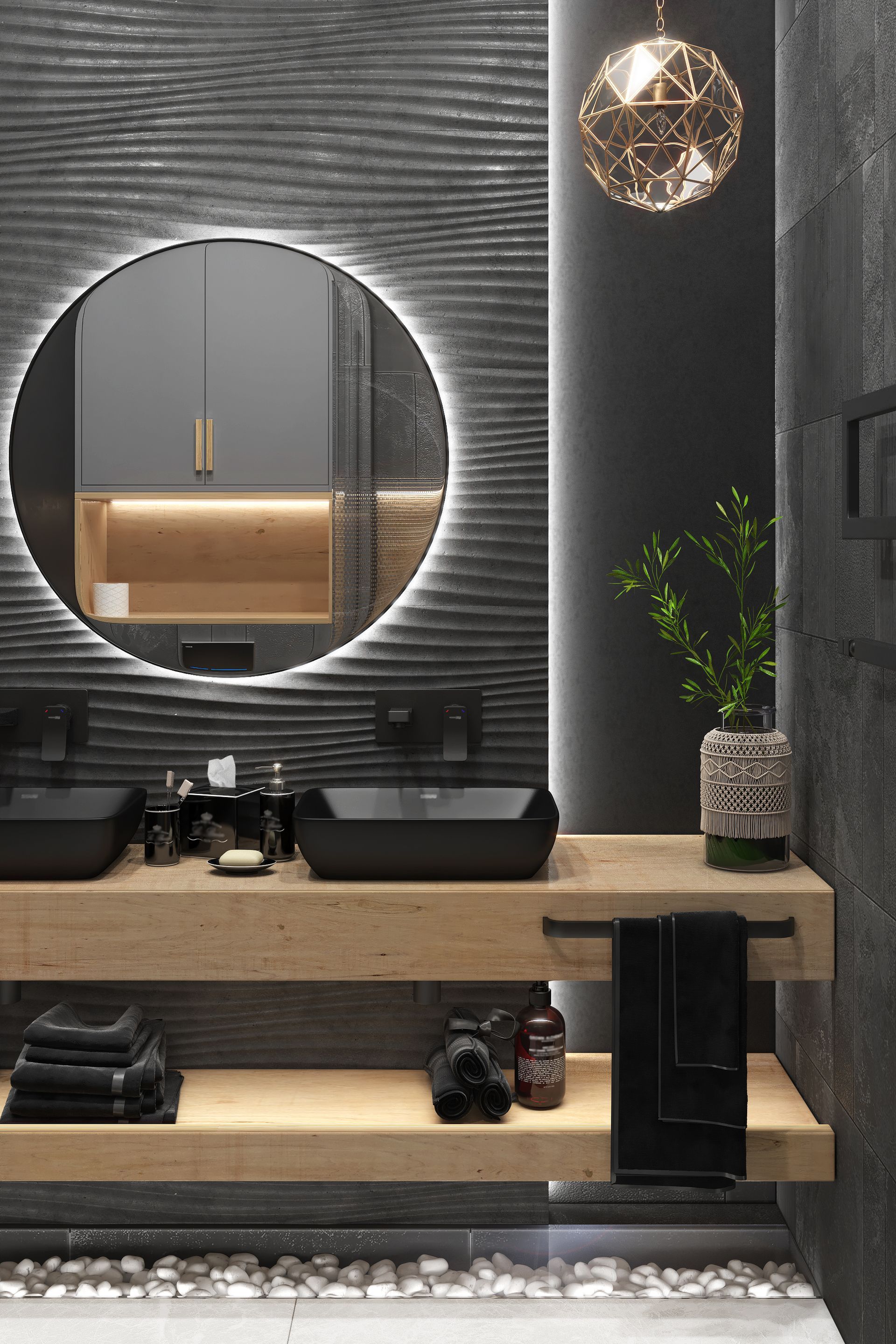 A bathroom with two sinks and a round mirror.