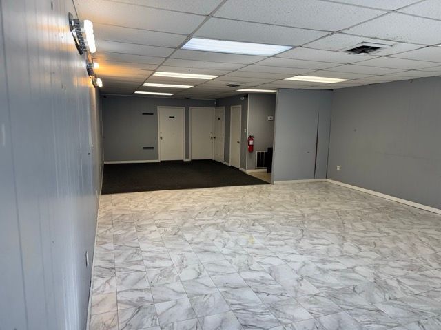 Showroom floor looking toward the private offices in the 1,200 SF space