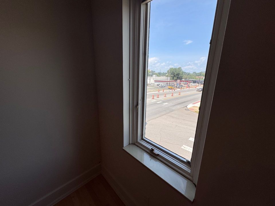 Window view from the upper level office toward 6th Avenue