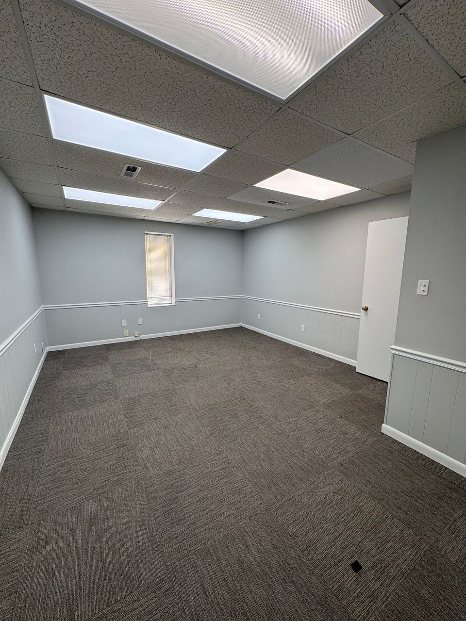 Private office with window in the 800 SF office suite at 1402 Central Parkway SW