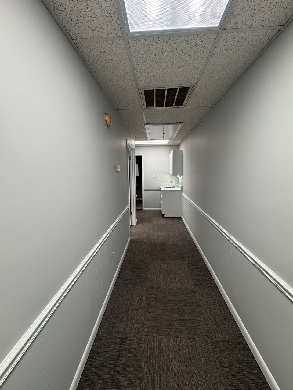 Hallway leading to kitchenette in the 800 SF office suite