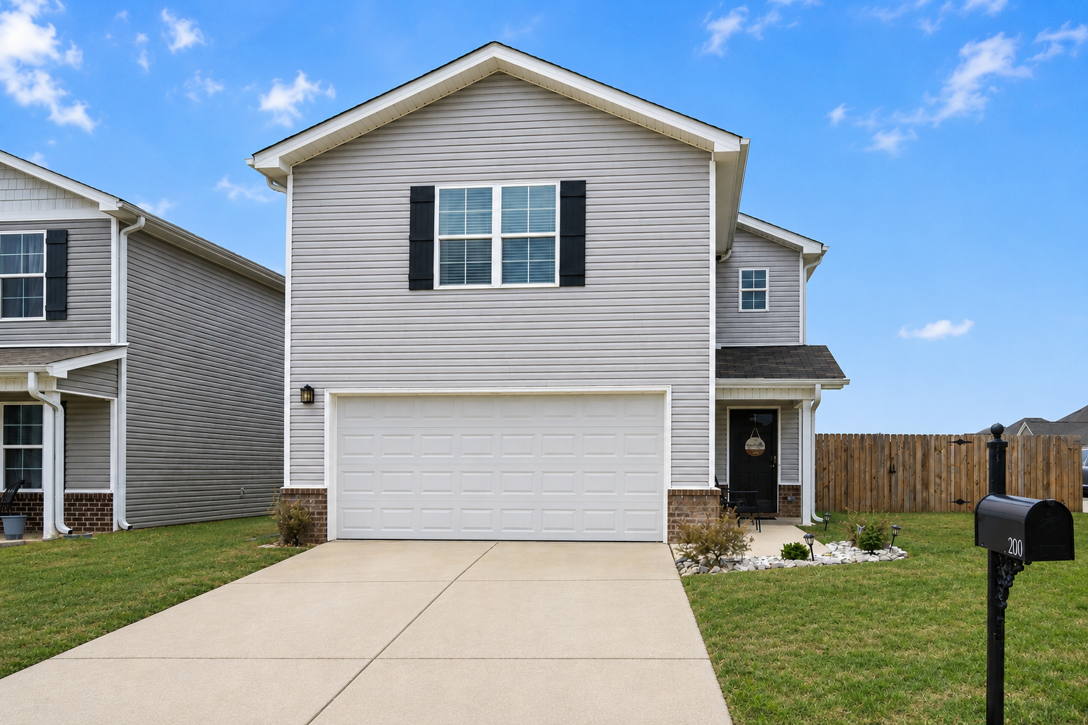 Front of 200 County Road 1700, Cullman AL, a two-story 2024 home with a 2-car garage and fenced corner lot