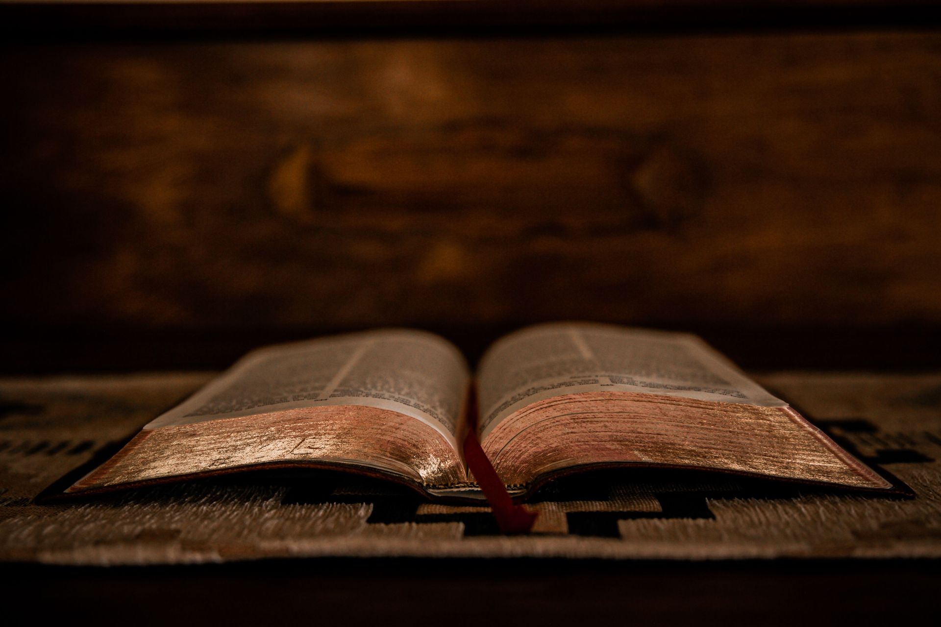 Open Bible on a wooden table