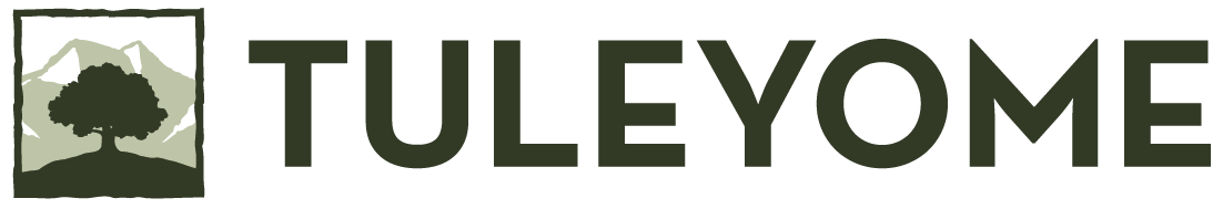A logo for tuleyome with a picture of a tree