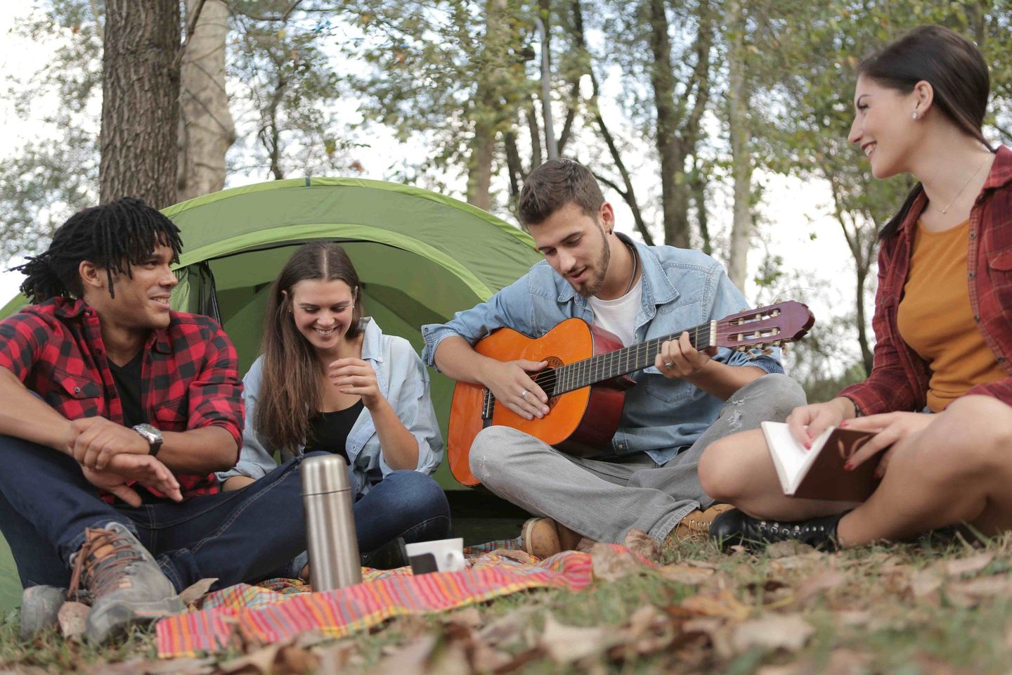 Friends having fun camping