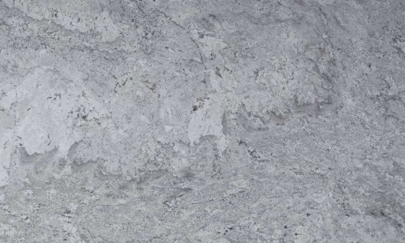 Gray-toned stone surface with mottled texture, resembling a weathered rock formation.
