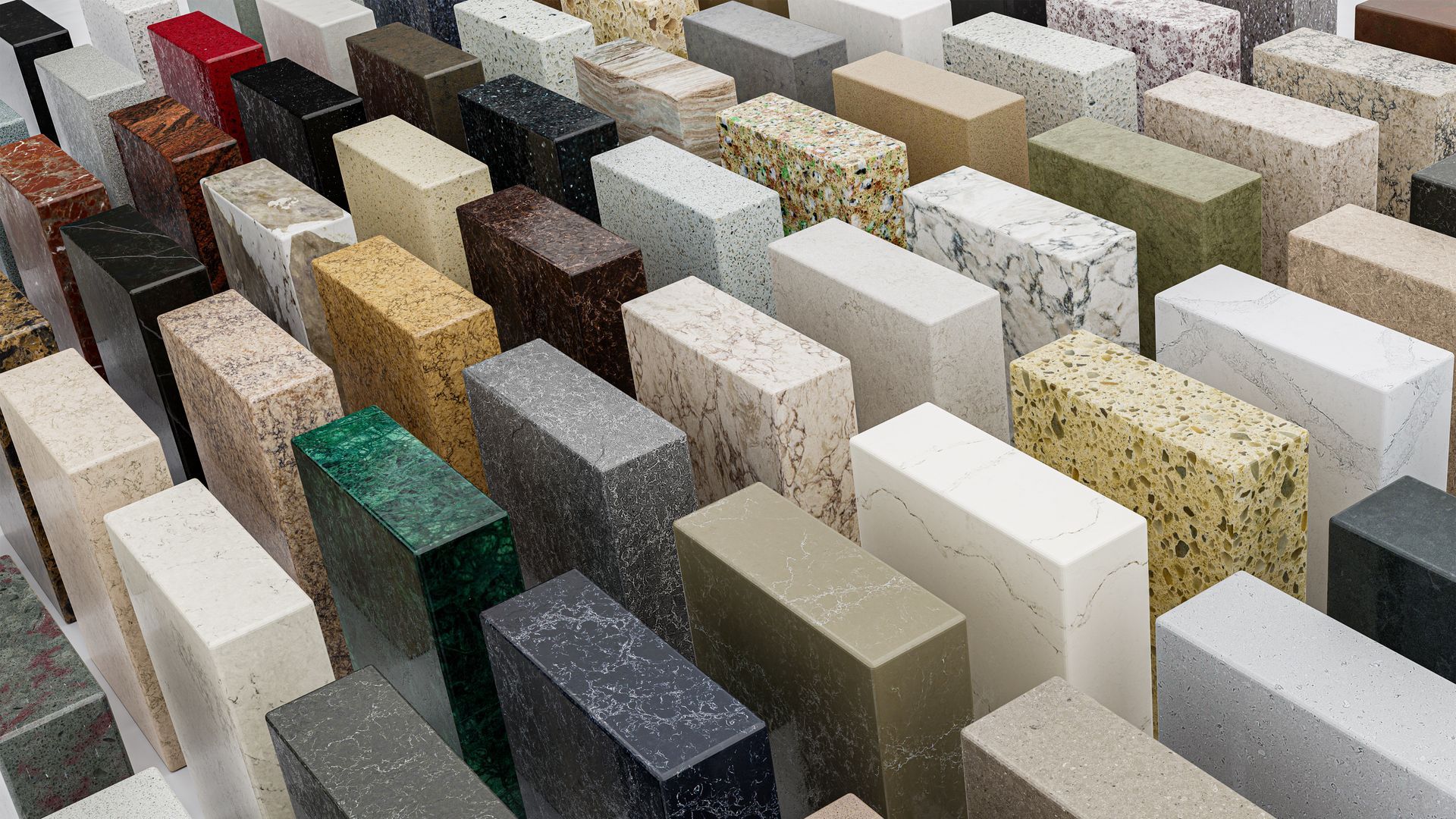 Stone and quartz countertop samples displayed in a wide range of colors and finishes.