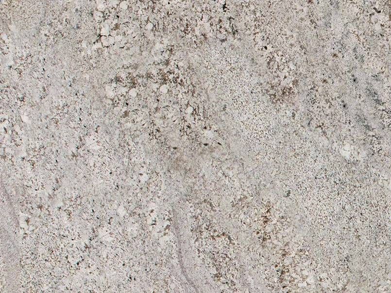 Light-colored granite countertop with speckled gray, brown, and pinkish-purple veining.