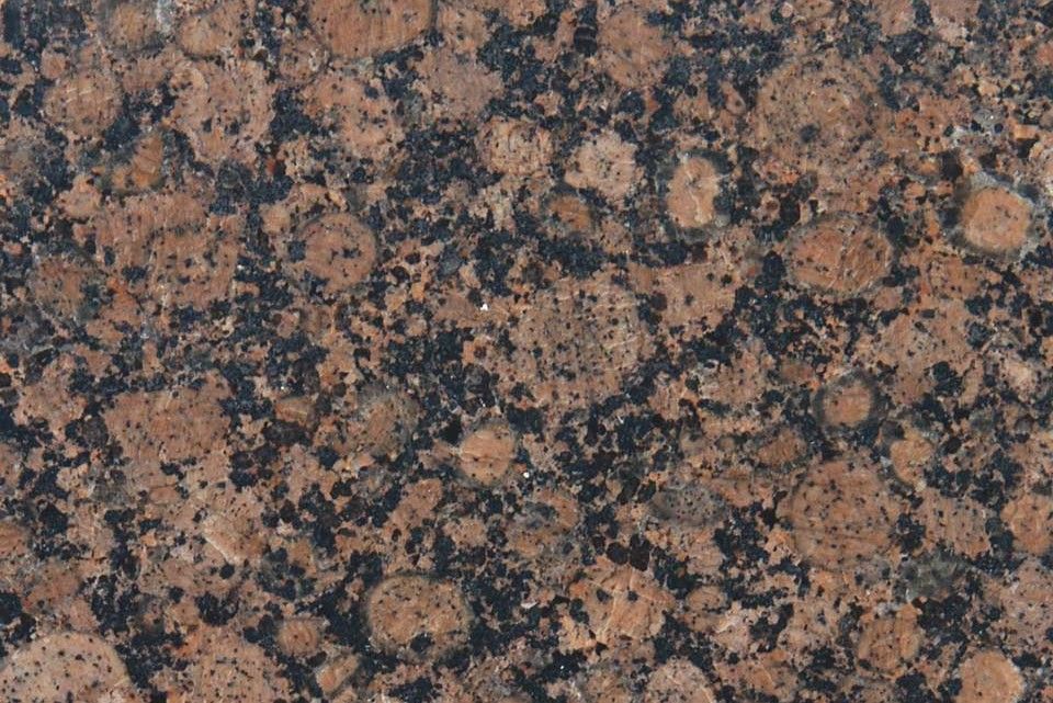 Brown and black speckled granite surface.