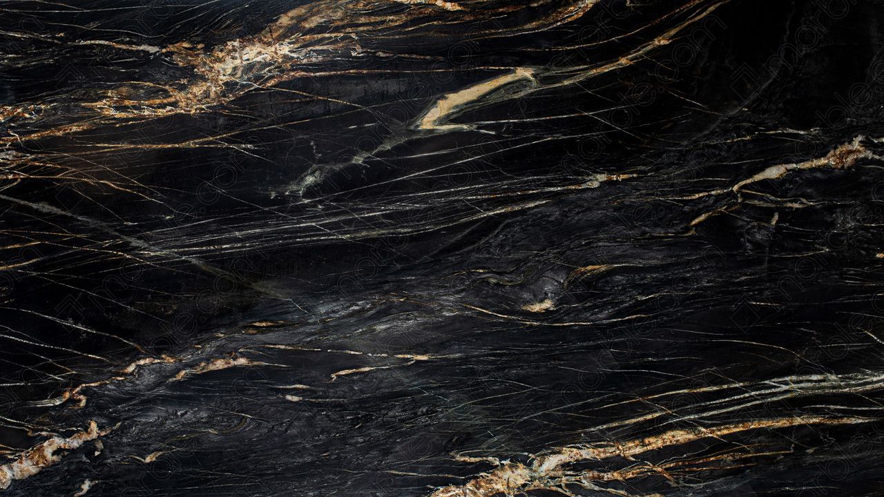 Black granite surface with gold and white veining.