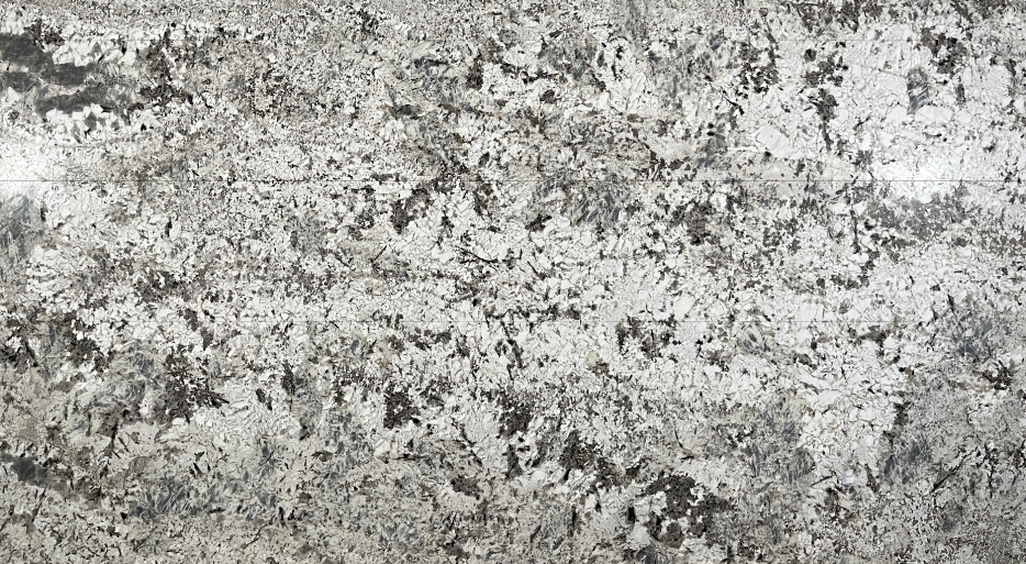 White and gray mottled pattern, possibly granite or marble.