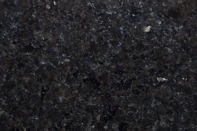 Dark blue-black granite countertop with varying shades and flecks of white and gray.