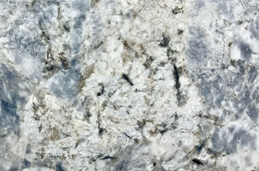 Light gray and white granite countertop with dark gray and black veining.