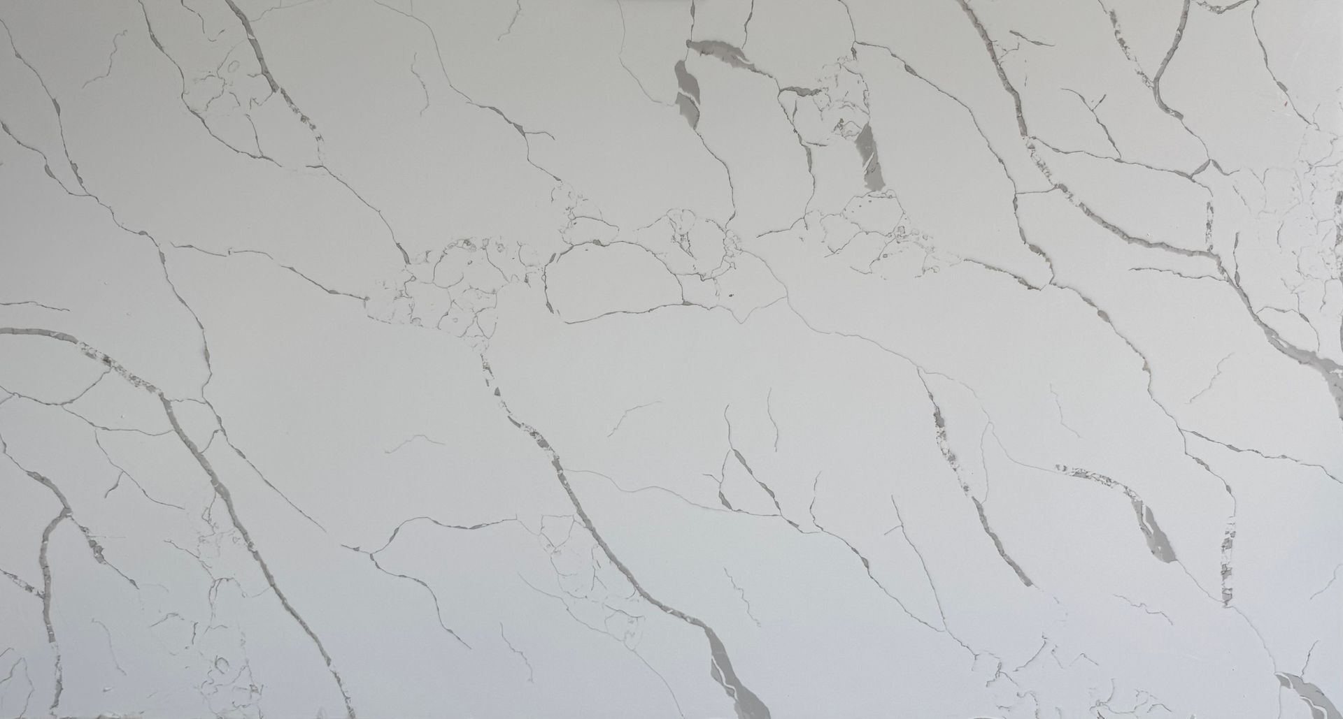 White quartz countertop with gray veining.