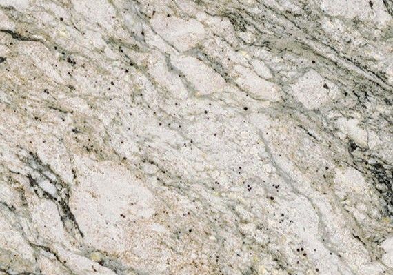 White granite countertop with gray and black veining, flecks, and irregular patterns.