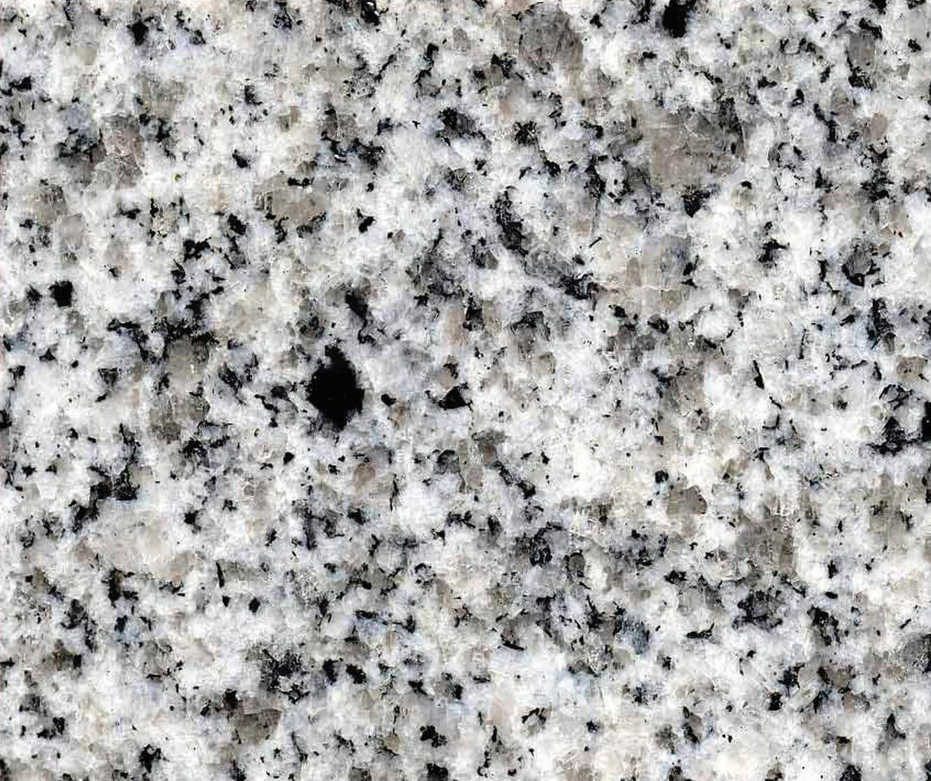 White granite with black and gray speckles.