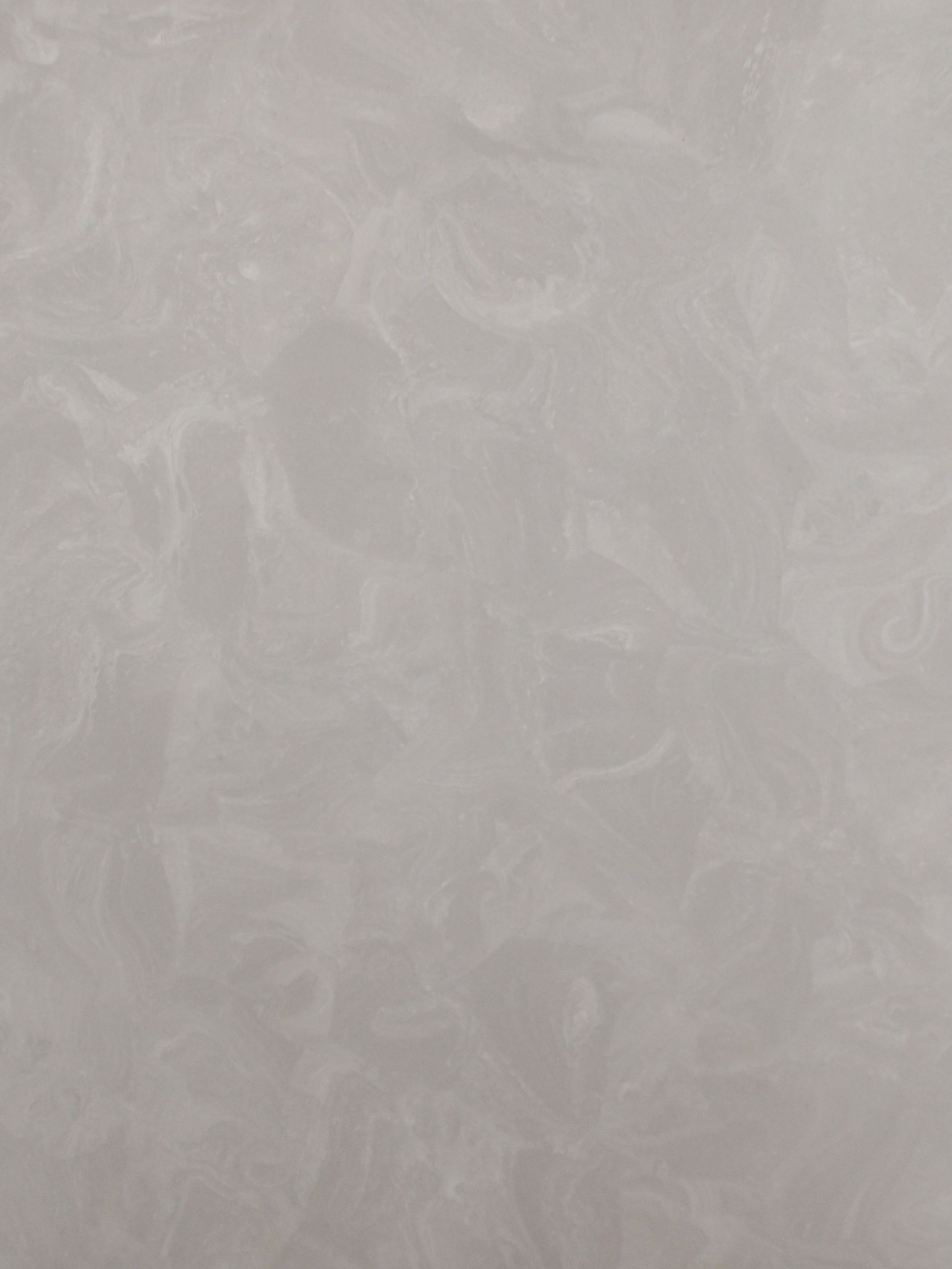 Textured, swirling pale gray background.