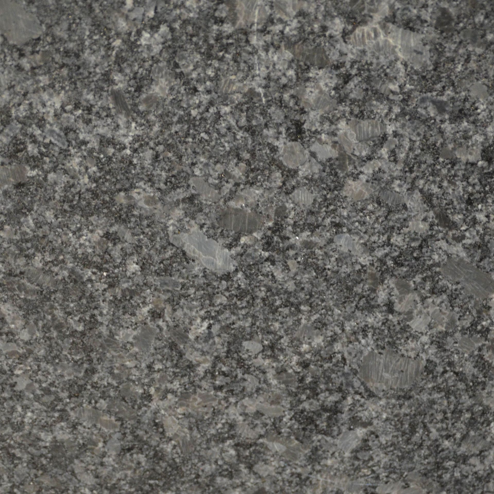 Gray granite countertop with speckled patterns.
