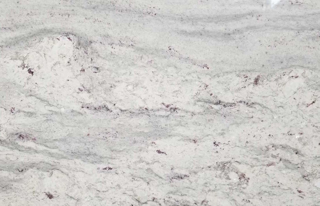 White granite countertop with flowing gray and brown patterns.